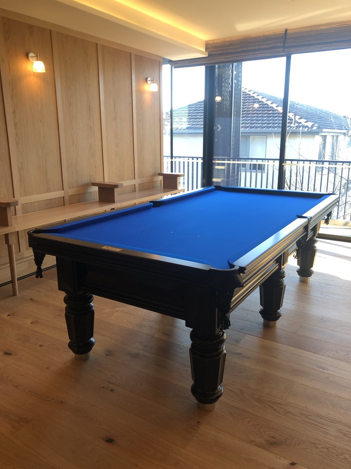 South Yarra apartment billiard room with blue pool table and balcony outlook