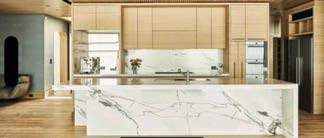 Marble island and joinery in the South Yarra apartment kitchen